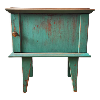 Patinated vintage bedside table