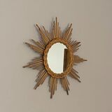 Sun mirror in braided rattan. 1960. 50cm.