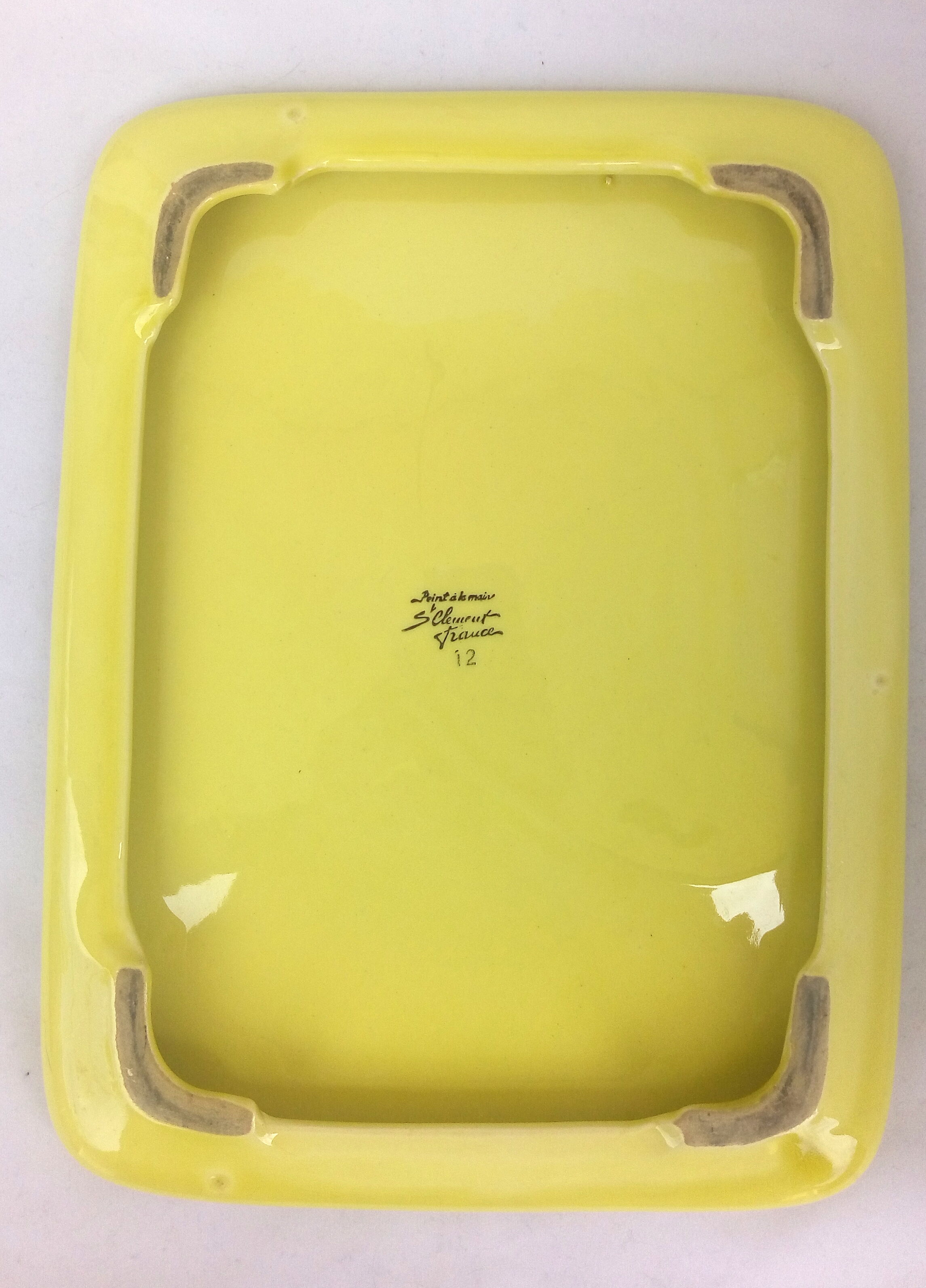 St. Clement ceramics under the plate 1960