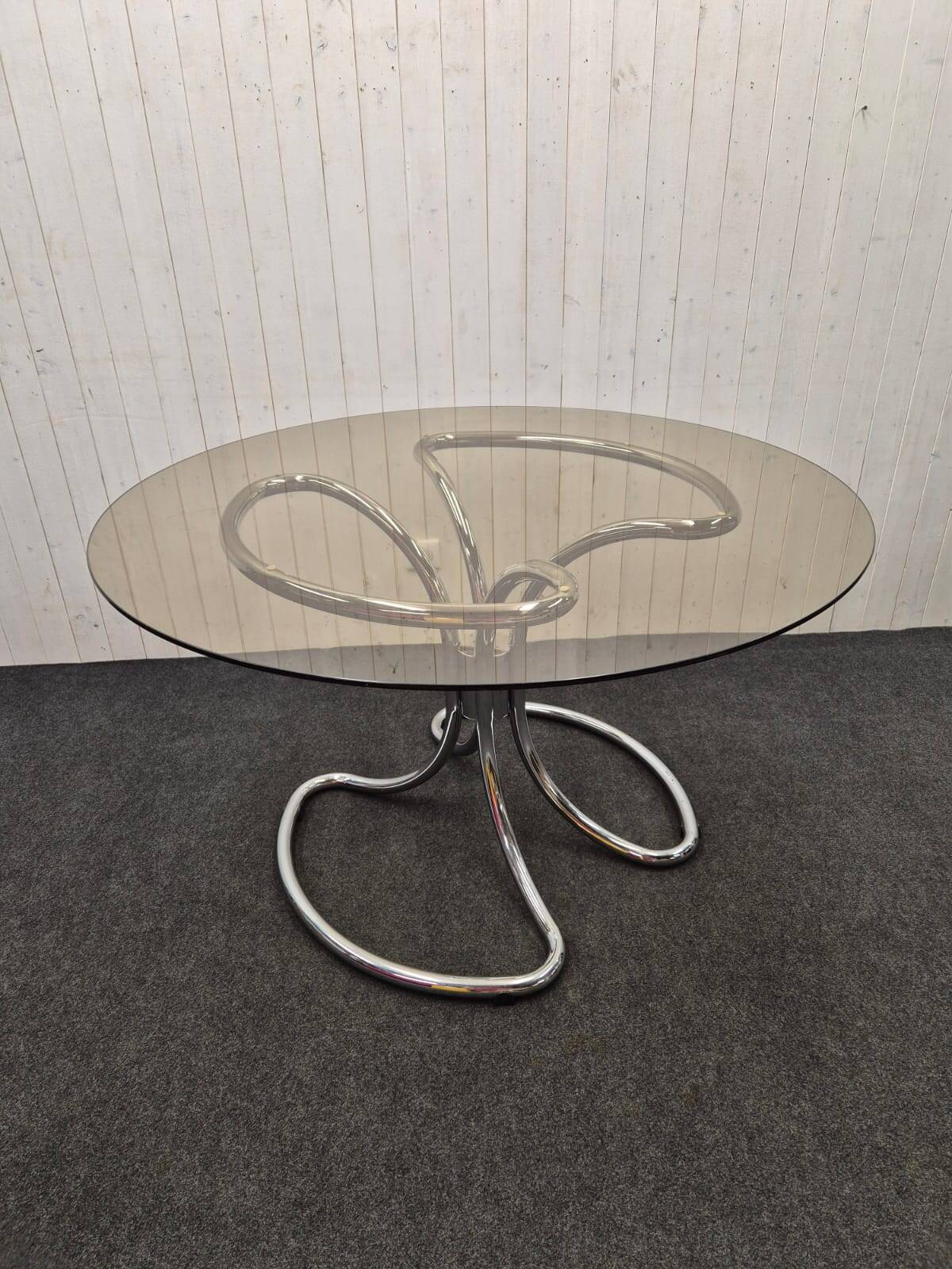 Chrome and smoked glass table.