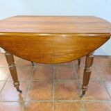 Round table 4 feet in cherry tree with 2 extensions