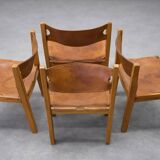 Set of 4 chairs from the 1960s in elm and patinated leather.