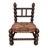 Turned wooden chair by Charles Dudouyt