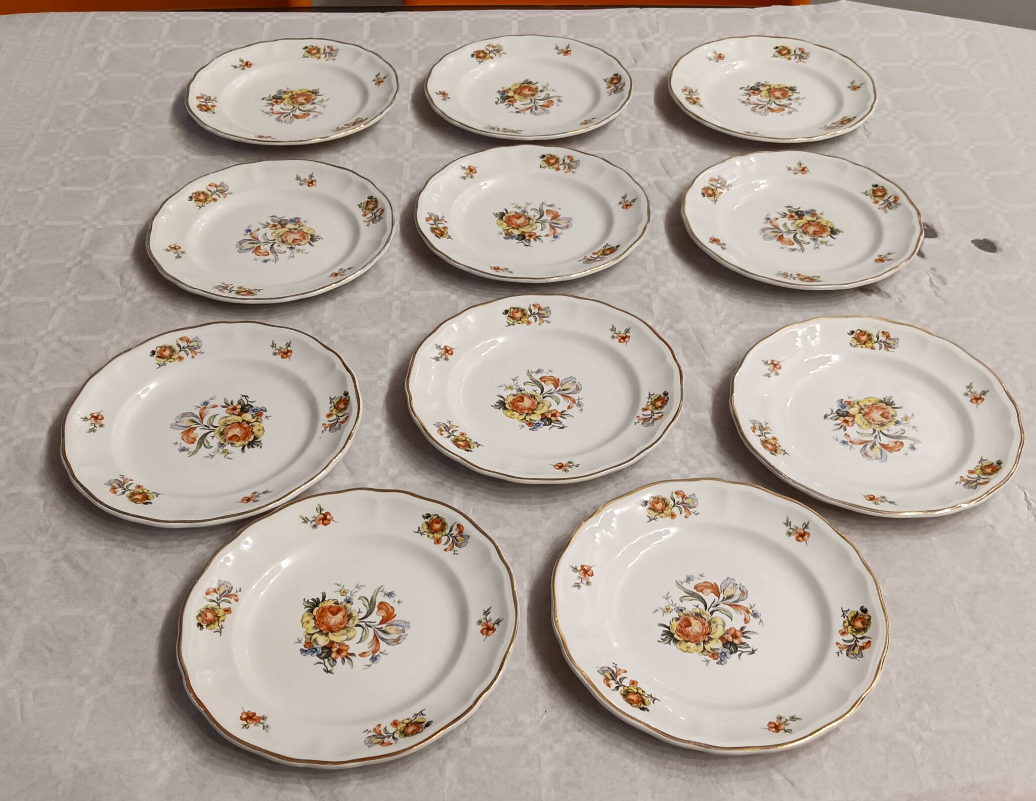 11 starter or dessert plates, KG Lunéville, Marie-Thérèse model - Yellow, blue floral patterns