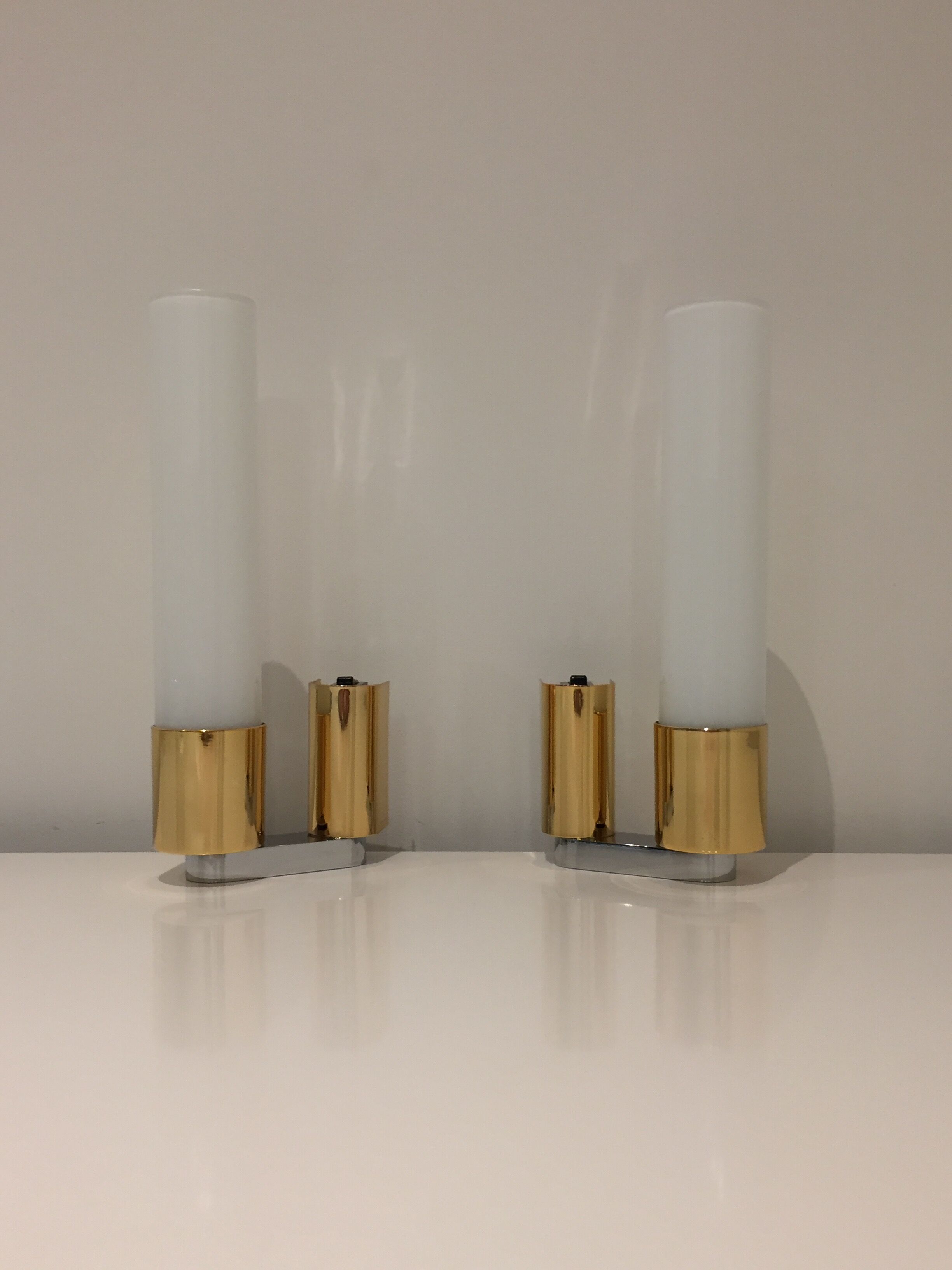 Pair of egoluce vintage orientable wall light in brass and Murano glass, Italy