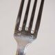 Silver plated metal service: 12 soup spoons, 12 forks and ladle.