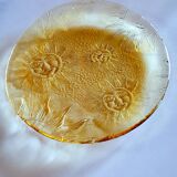 Glass plate decorated with suns, 1980.