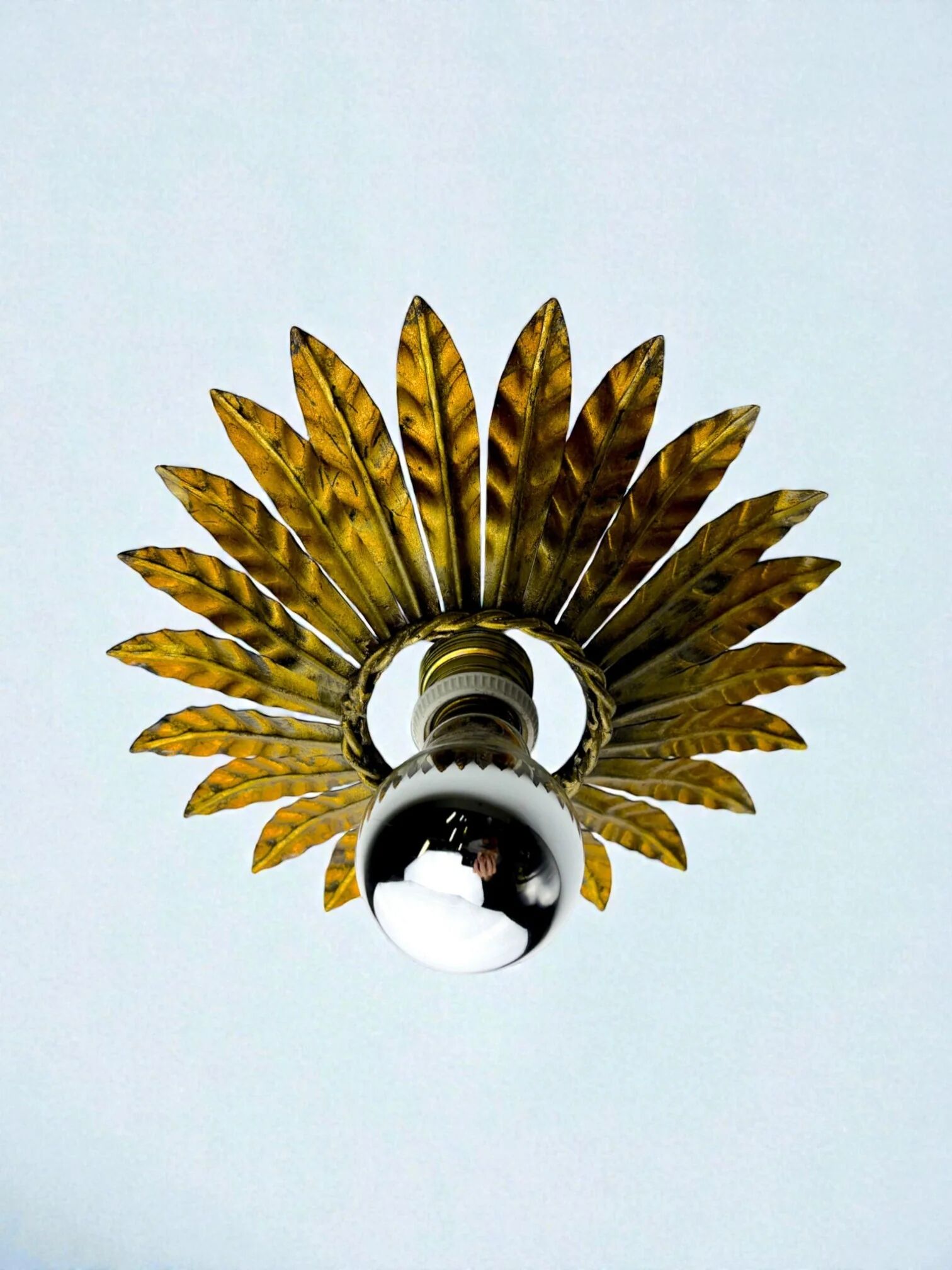 Spanish sunburst flush mount light fixture in gilt iron, circa 1960s