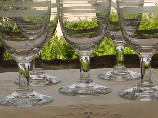 Set of 5 antique bistro glass water glasses.