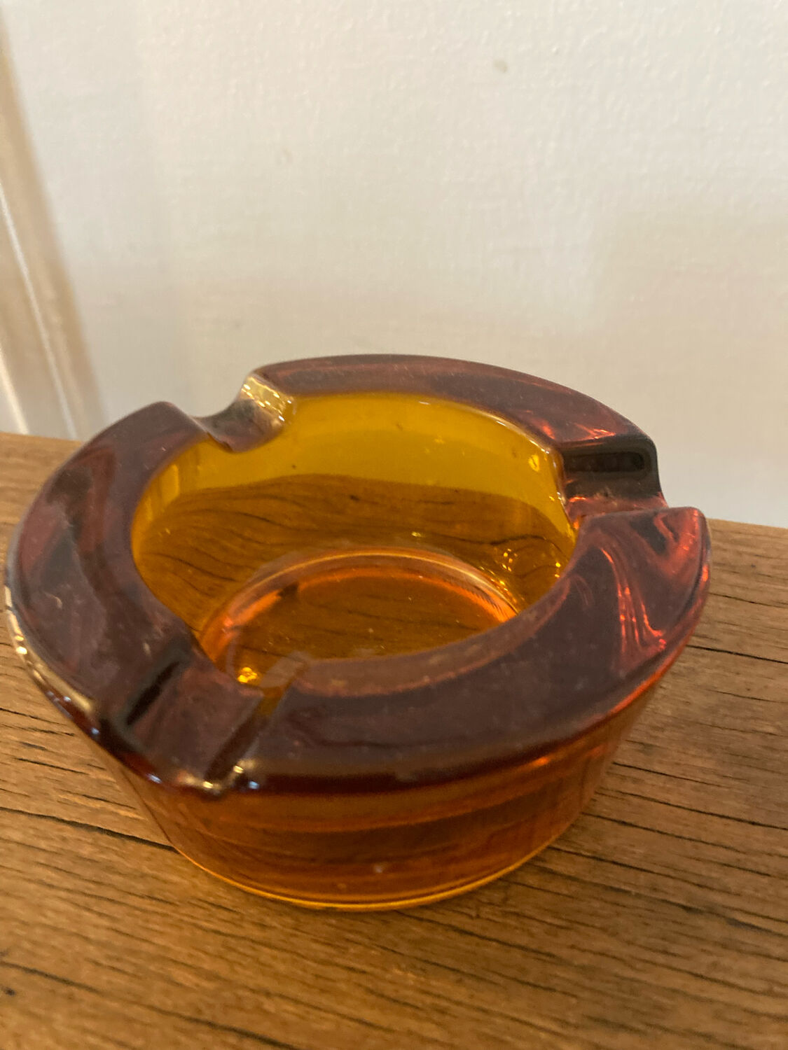 Amber glass ashtray