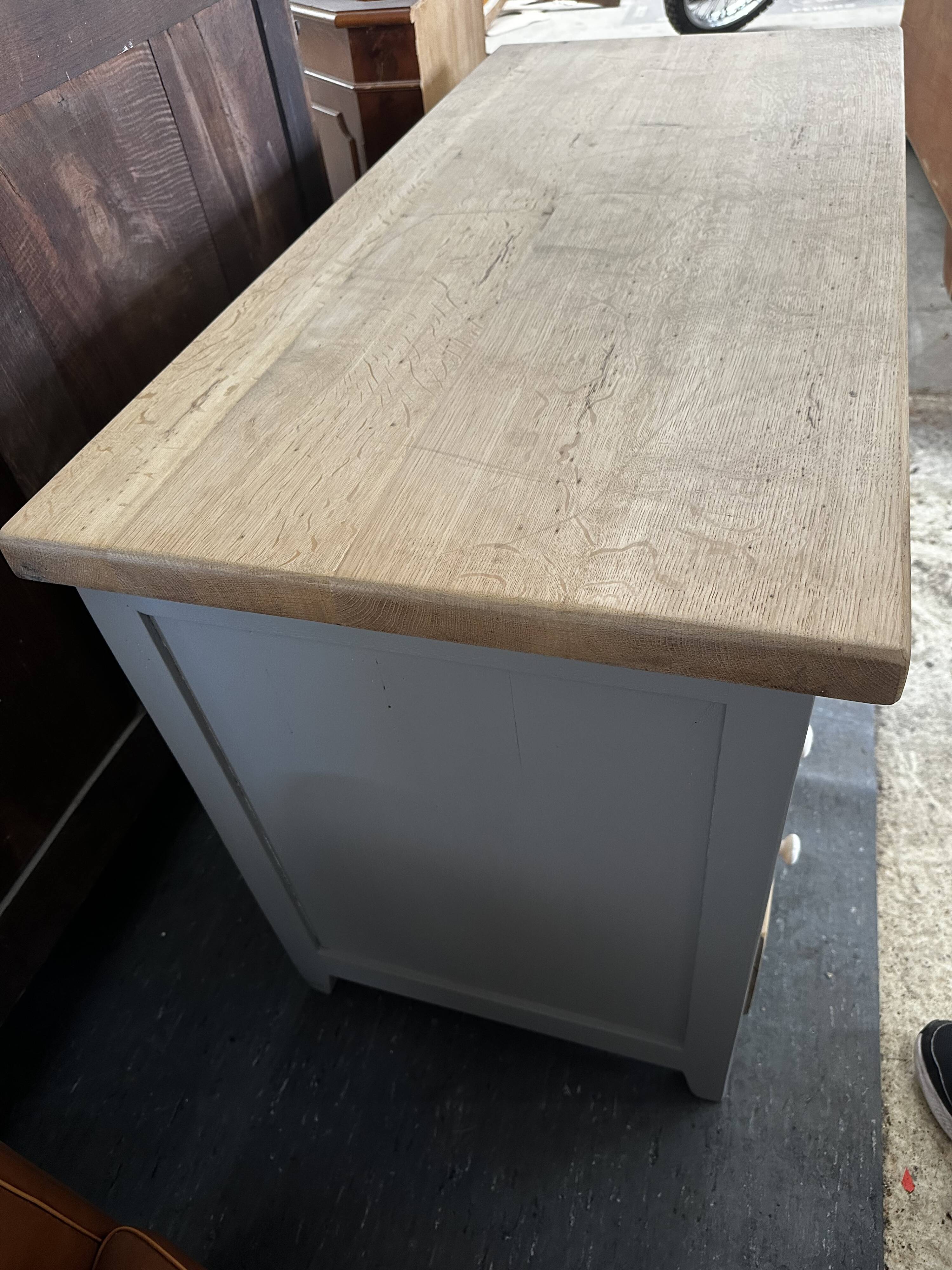 Vintage sideboard painted in gray and raw wood