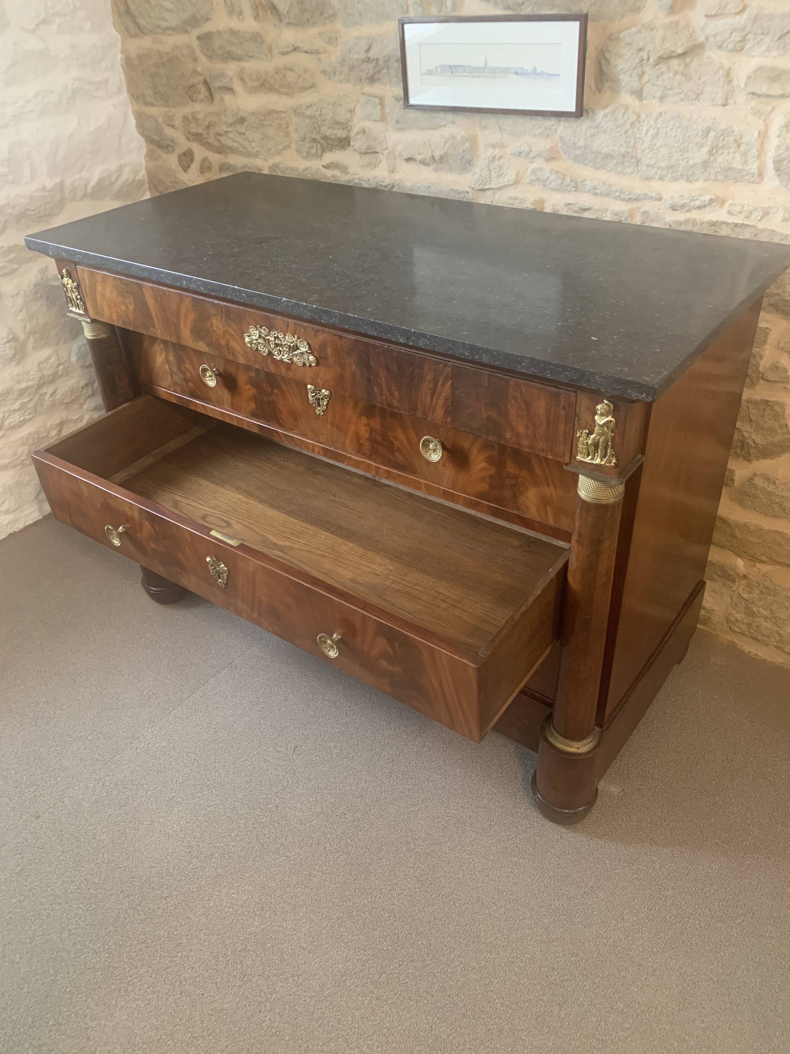 Empire chest of drawers with columns, 19th century mahogany