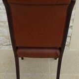 Chic Vintage Chesterfield style chair with wooden frame and faux leather