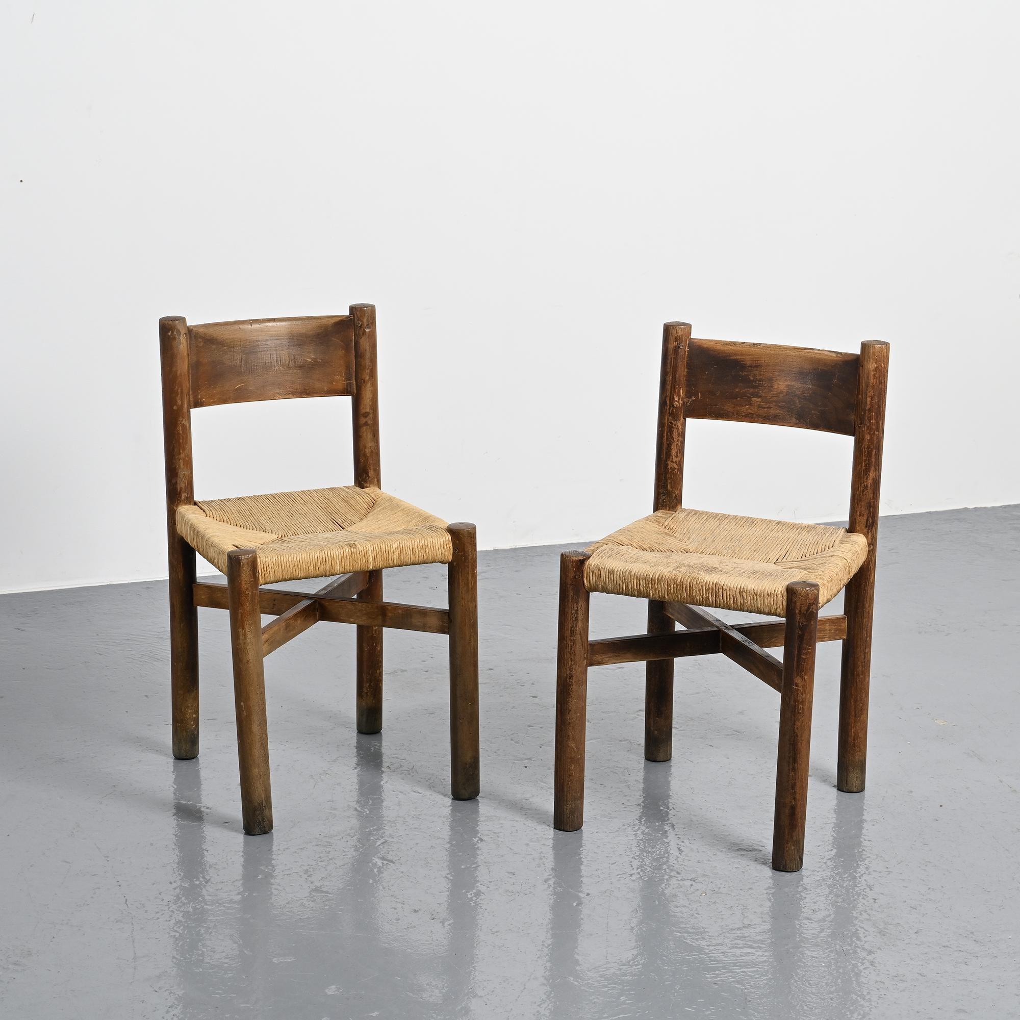 Pair of Méribel chairs by Charlotte Perriand, vintage edition BCB, circa 1950.