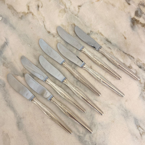 Series of 8 dessert knives, silver metal