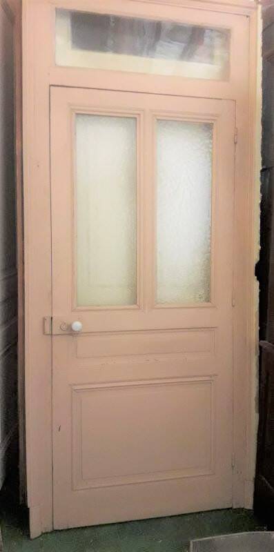 Large glazed door and its old glazed transom.