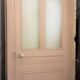 Large glazed door and its old glazed transom.