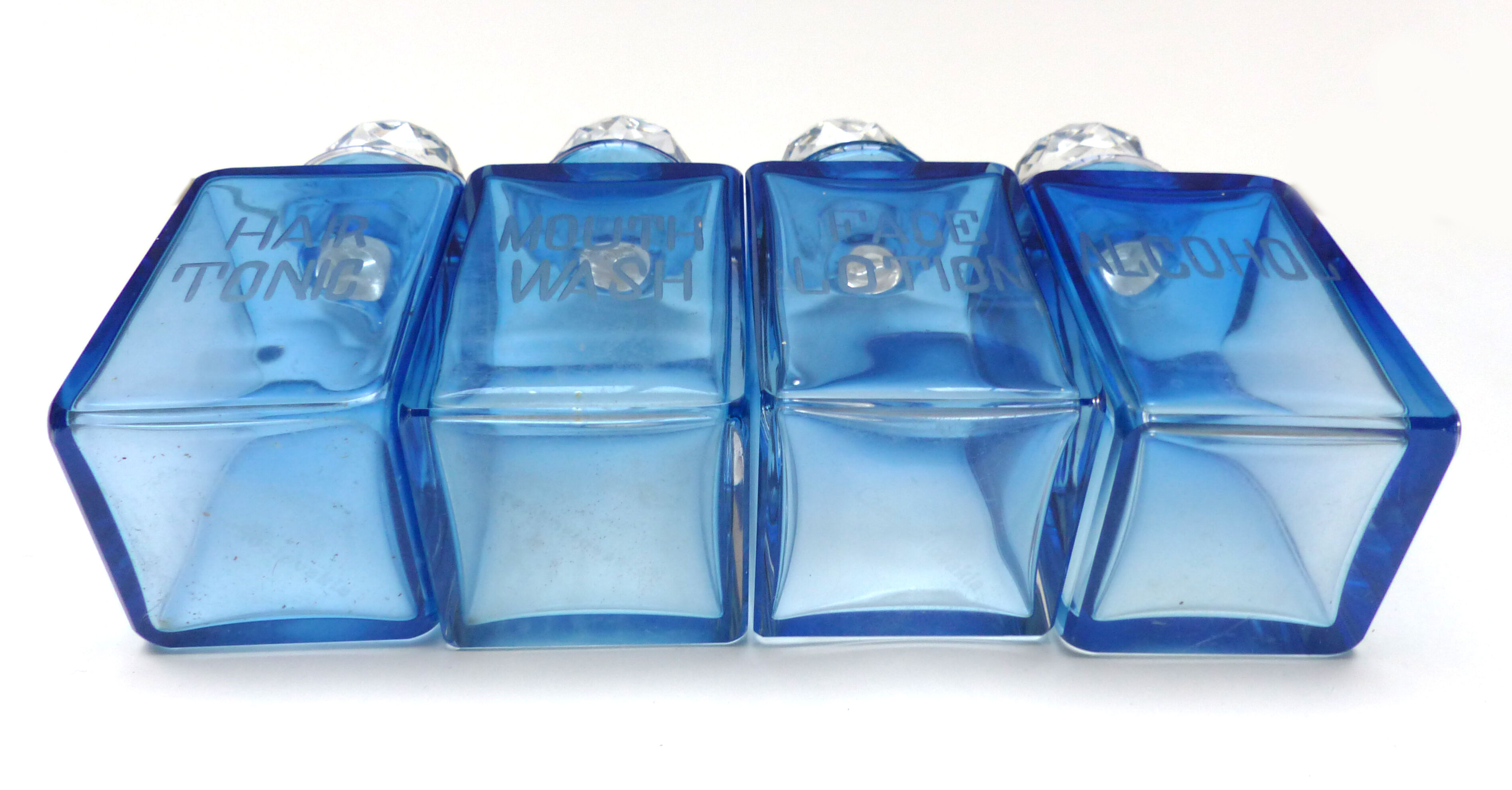 Set of 5 sapphire blue Bohemian crystal toilet bottles.