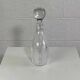 Carafe ancienne en verre sculpté
