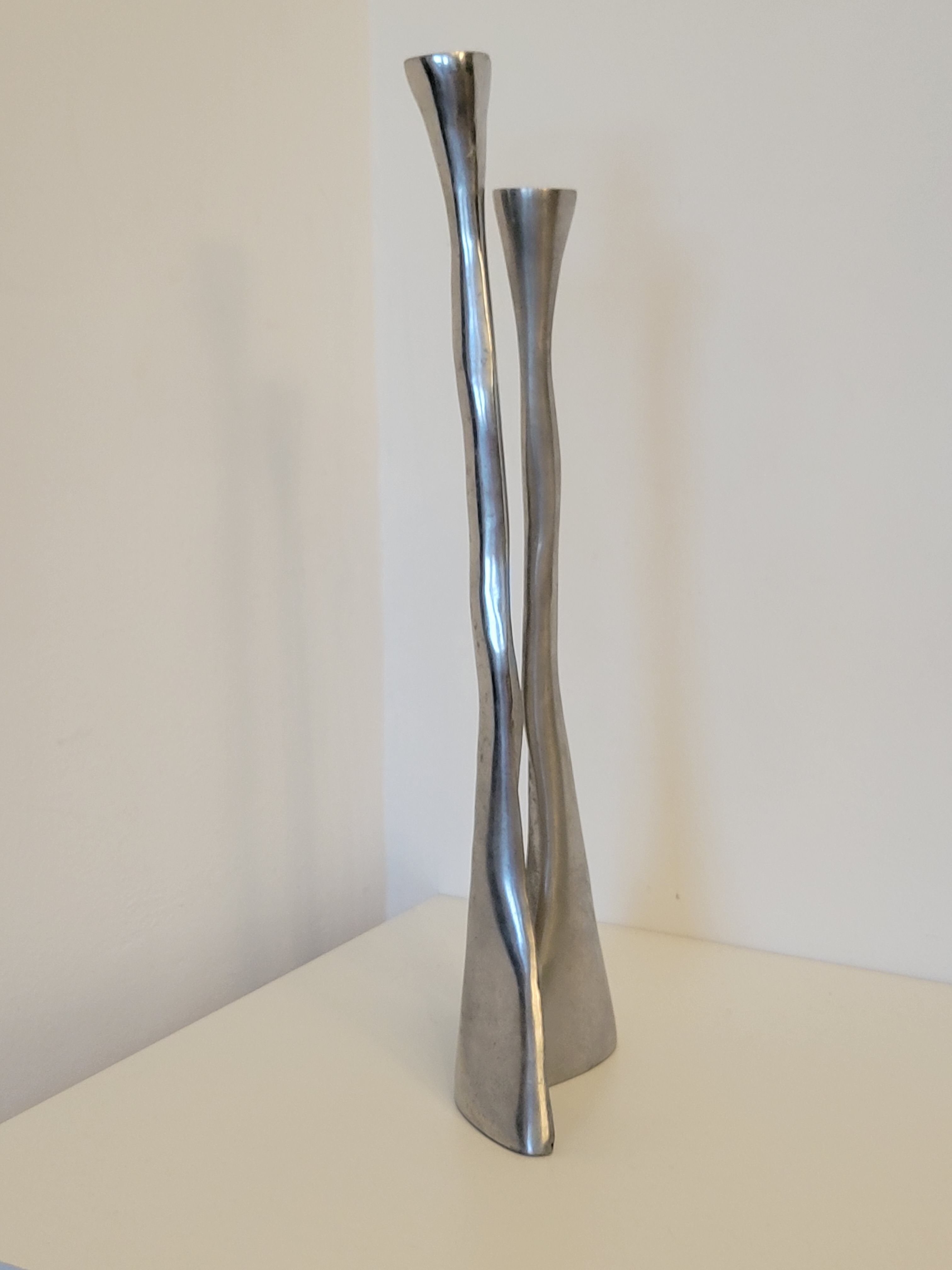 Pair of brutalist metal candlesticks in organic shape sleek design