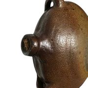 Old stoneware flask known as a toad from the 19th century.