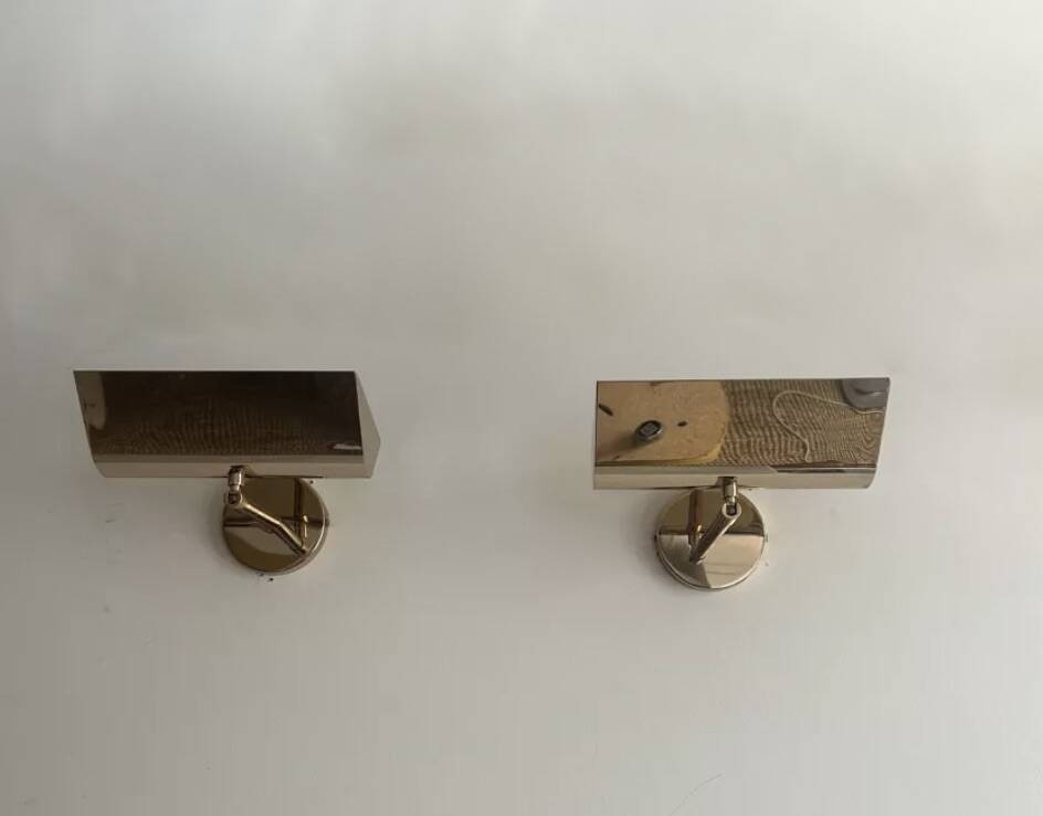 Pair of vintage adjustable solid brass wall lights France 1970
