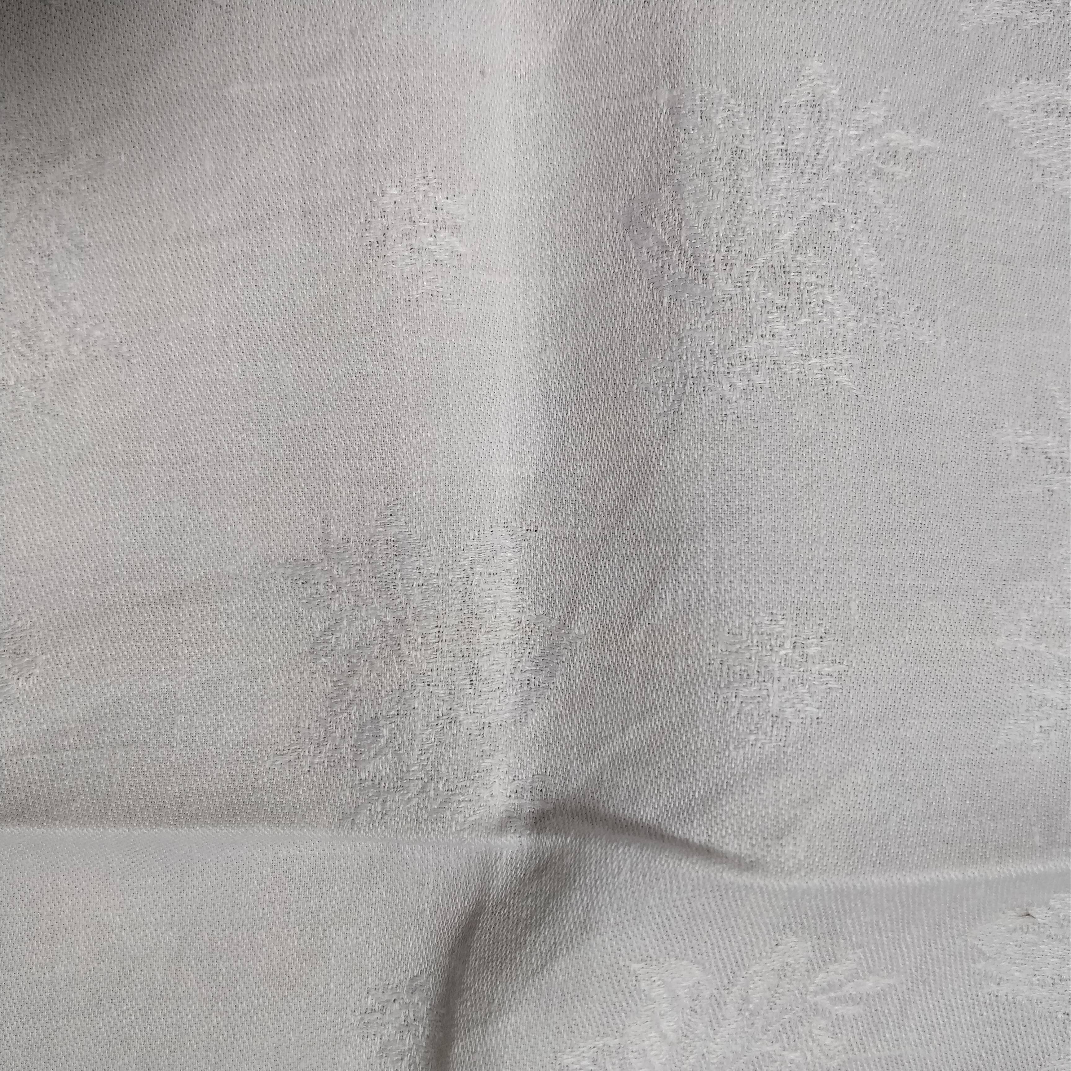 White linen towels embroidered