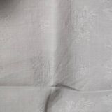 White linen towels embroidered