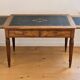 Very elegant antique desk in the Louis XVI style, probably made of walnut.