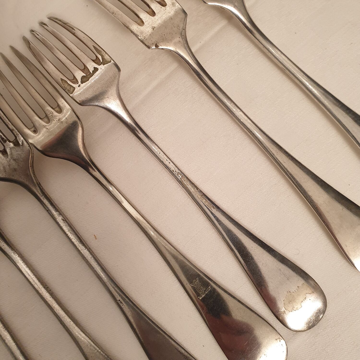10 mismatched silver metal forks