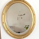 Miroir doré oval