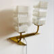 Vintage wall light in brass and glass from the 1960s.
