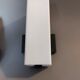Pair of modernist sconces in black metal and white opaline vintage