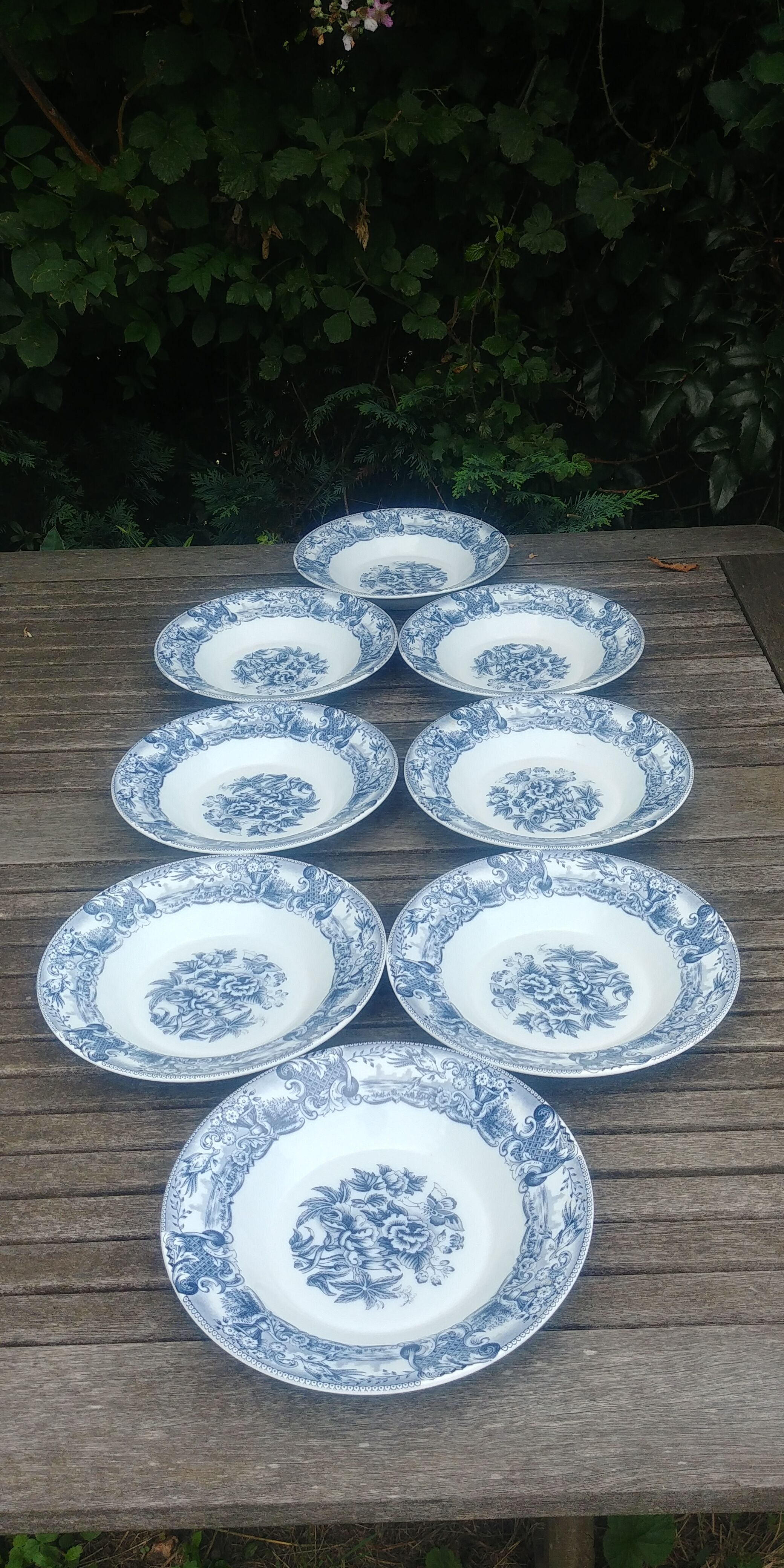 Set of eight hollow plates of the rivanel brand france baroque décor