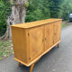 Vintage enfilade with tapered legs.