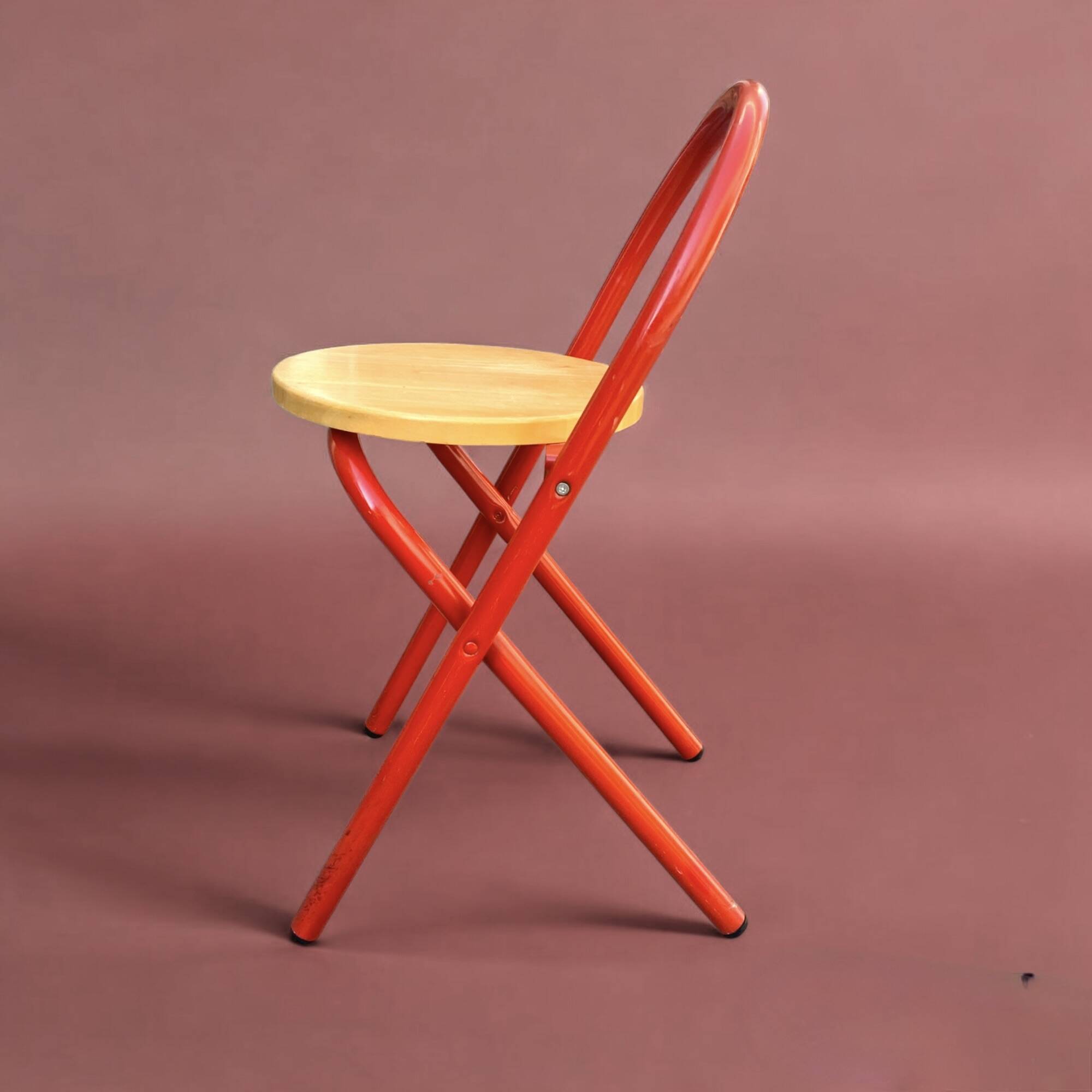 Vintage folding chair in red painted metal and wood