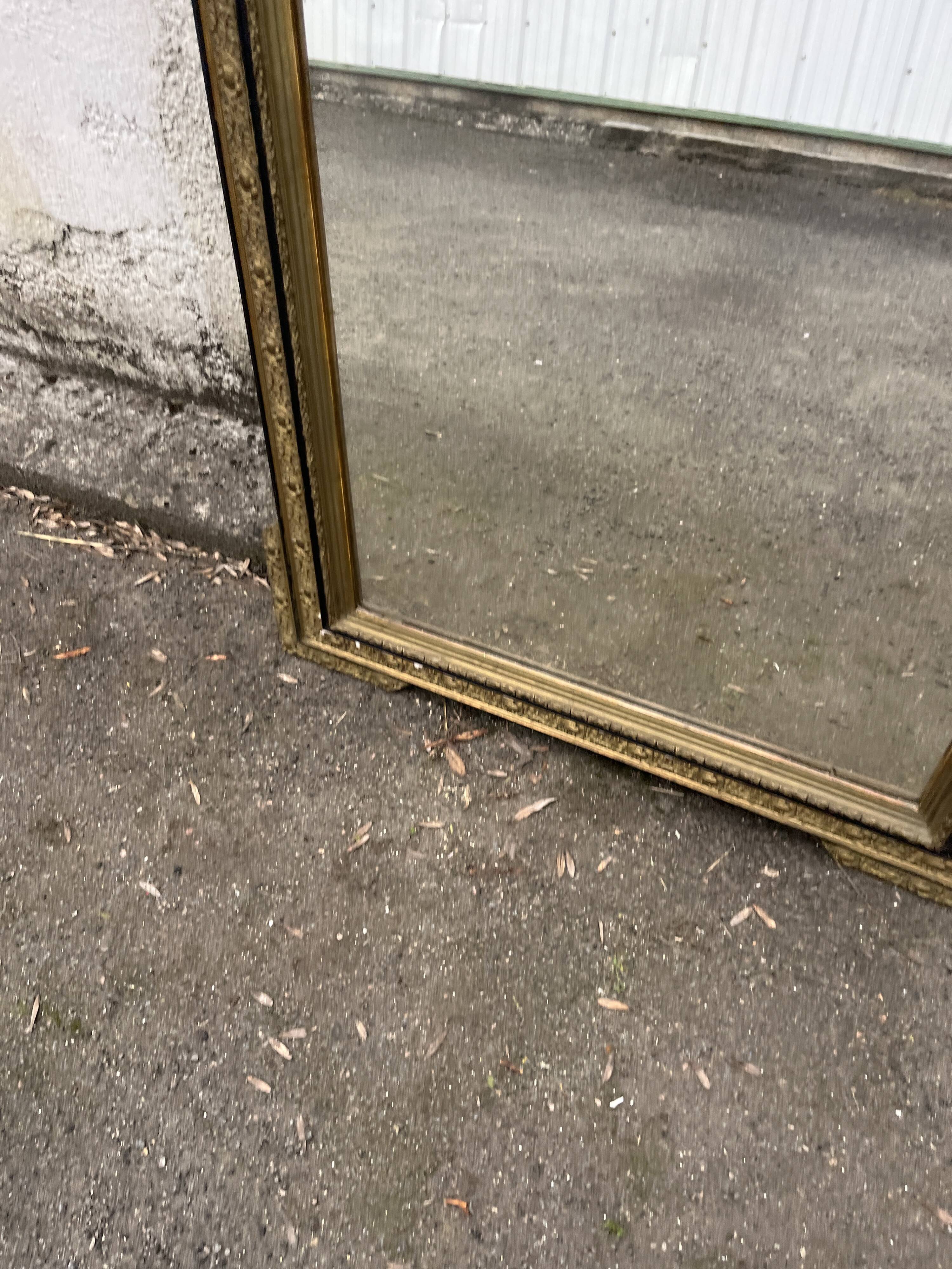 Large antique gilt mirror with scroll and shell decoration, 144 cm