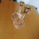 Dorothy Thorpe "Pretzel" candlestick in lucite and gilded brass 70s