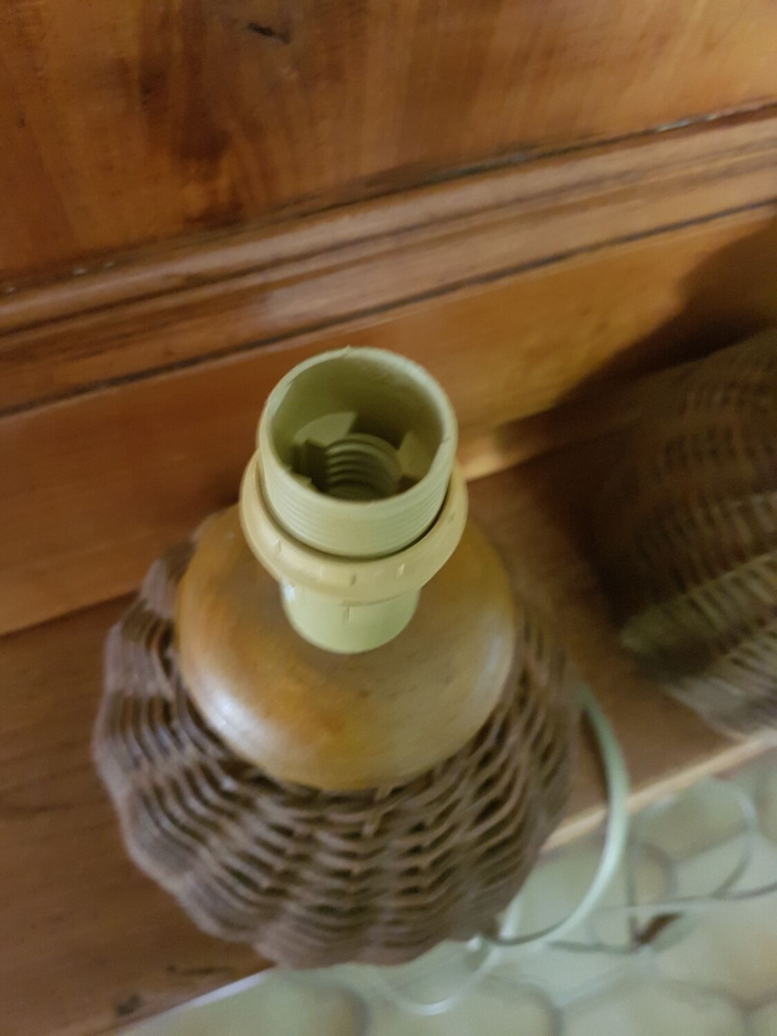 Pair of small ceramic lamps, dressed in rattan