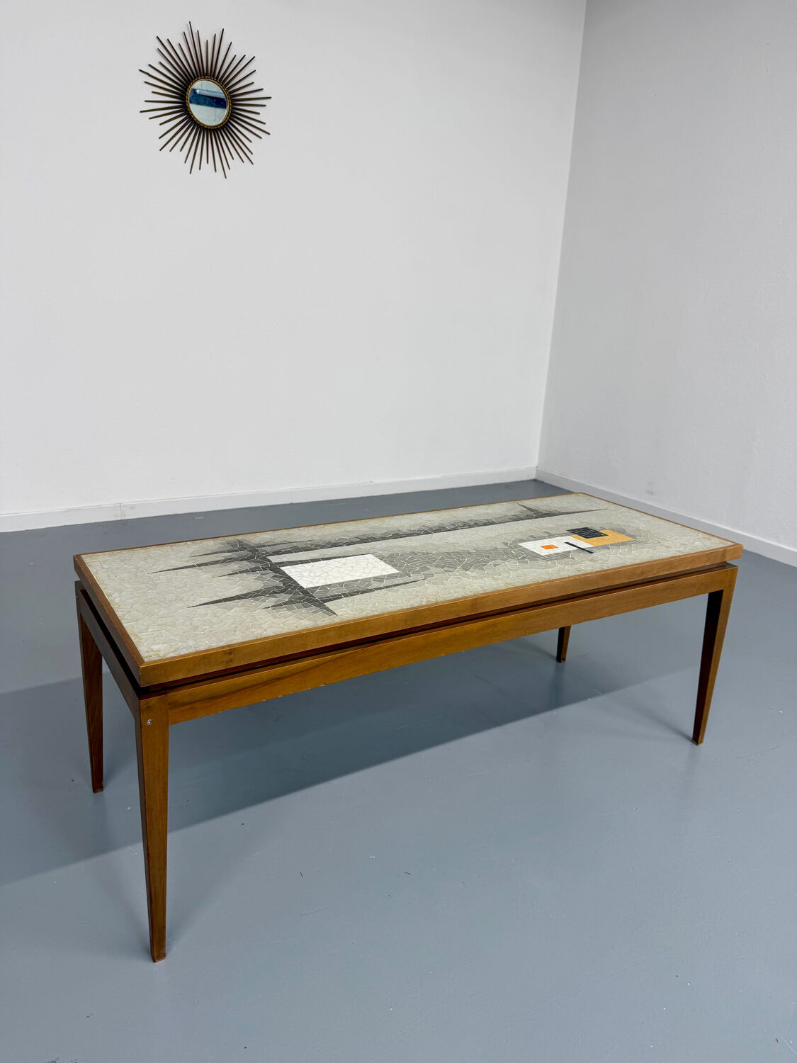 Vintage coffee table with mosaic top, 1960s modernist graphic design.