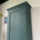 Green hosiery cabinet
