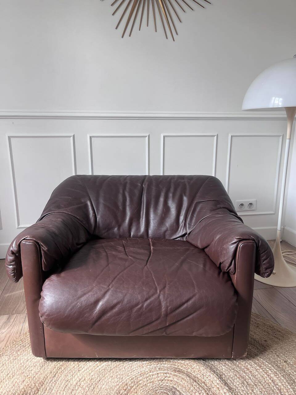 Brown leather armchair from the 1970s.