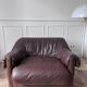 Brown leather armchair from the 1970s.