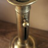 Push-button brass torch candle holder