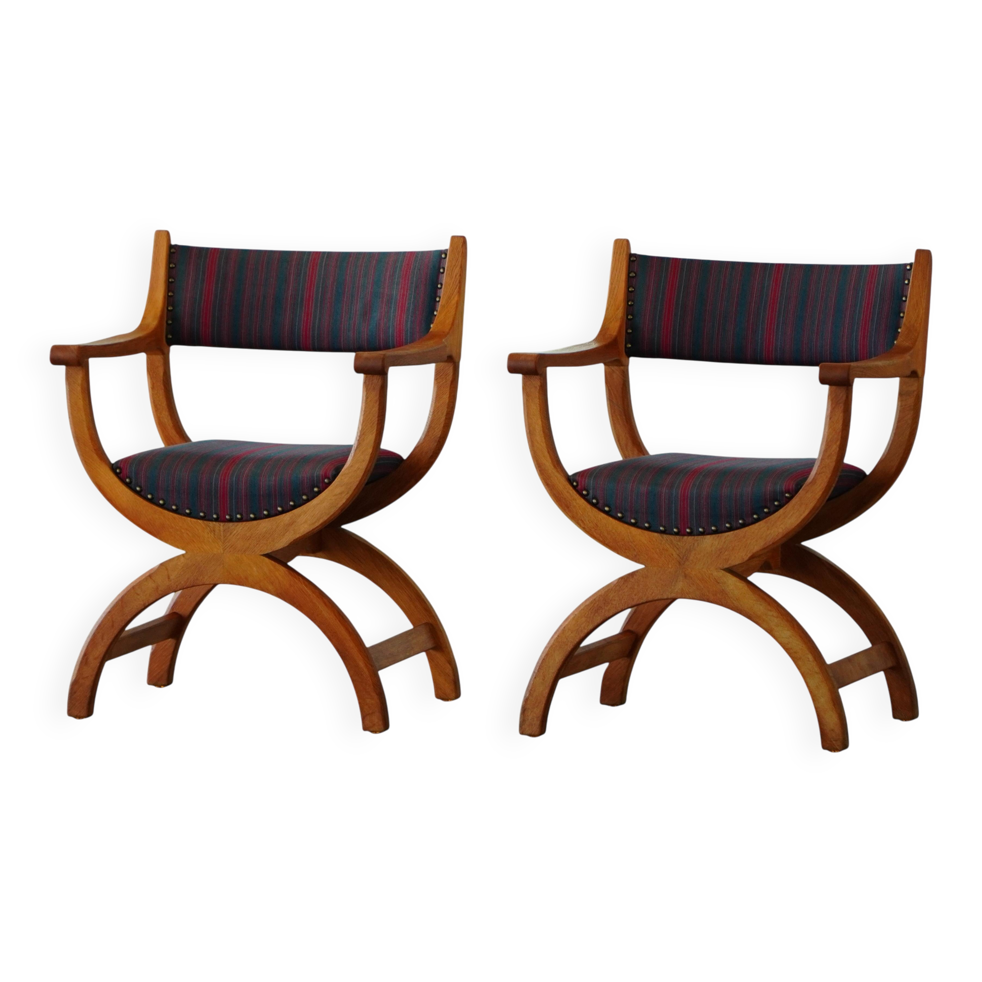 Henning Kjærnulf, pair of oak armchairs, model "Kurul", Danish modern style, 1960s.