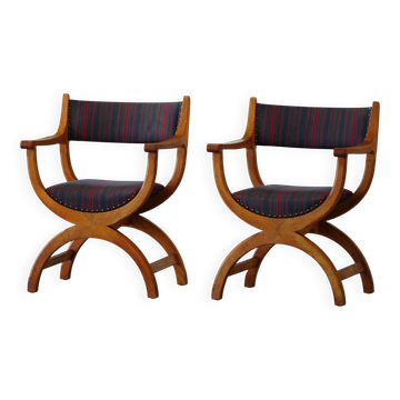 Henning Kjærnulf, pair of oak armchairs, model "Kurul", Danish modern style, 1960s.