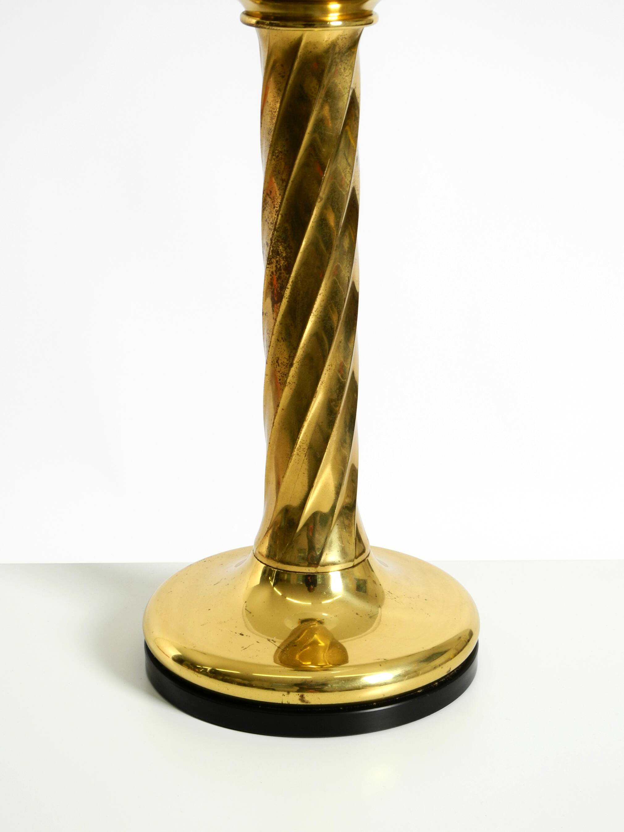 Large 1960s brass column-style table lamp with frosted glass globe