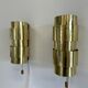 Pair of Scandinavian teak and brass sconces