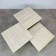 Trio vintage travertine nesting coffee tables