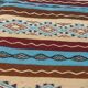 Multicolored hand-woven Berber rugs in natural wool